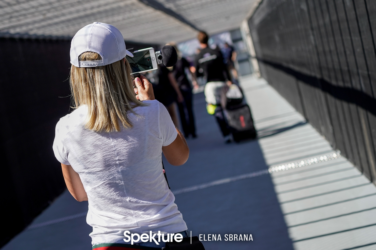 Earchphoto - Brooke De Boer, flmmaker and producer of FastlifeTV, follows her husband Derek to the autograph session at PIR. 