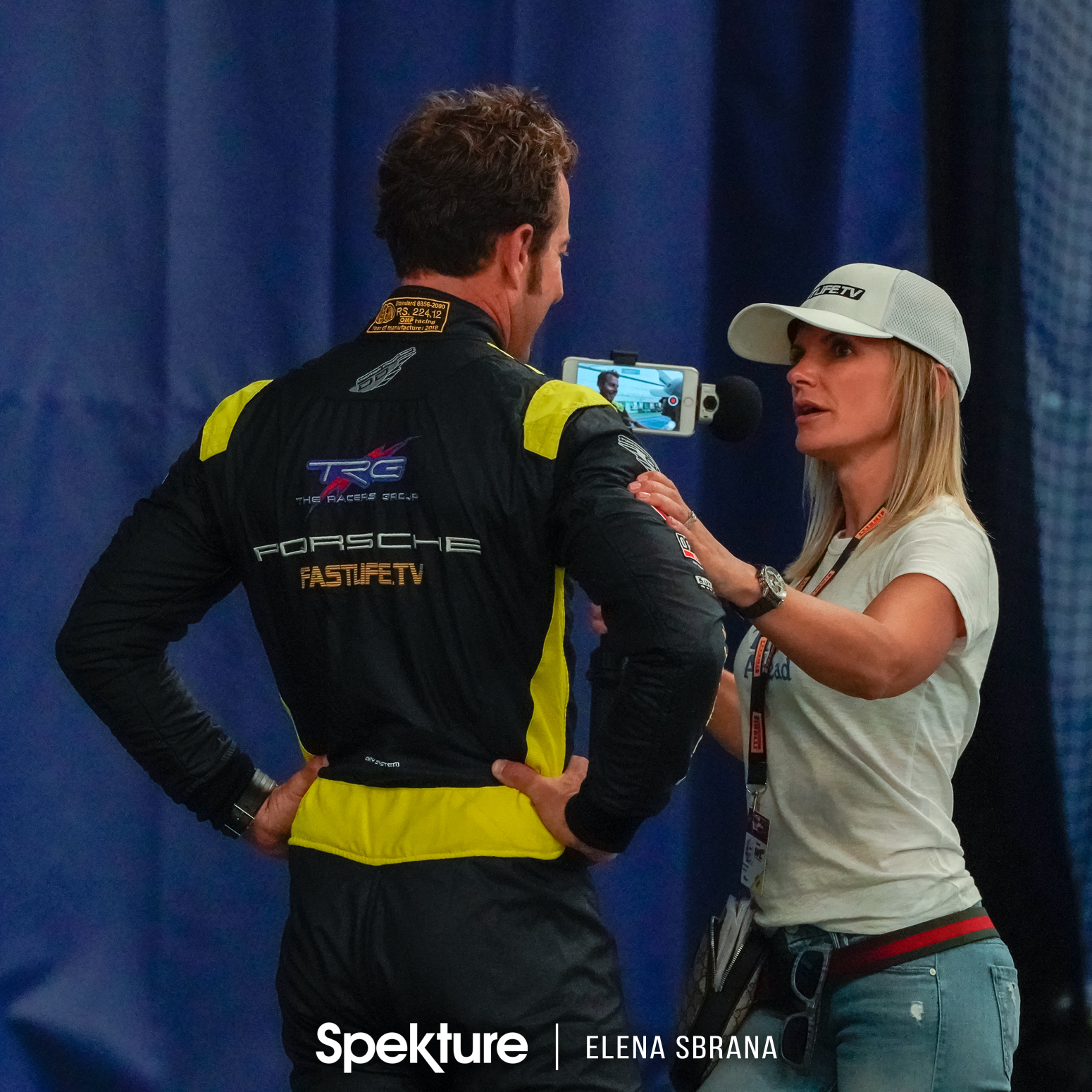 Earchphoto - Brooke De Boer filming with her husband Derek before a public speaking event.