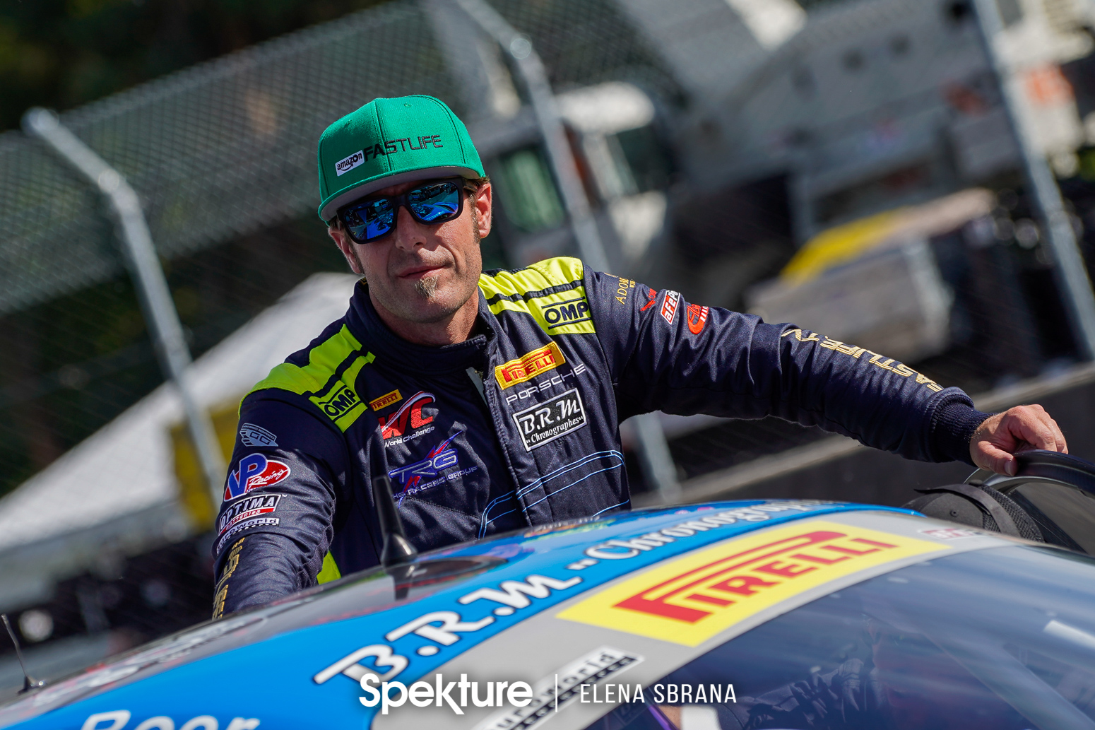 Earchphoto - Derek with the Porsche at PIR. 