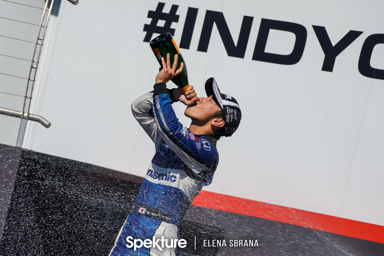 Earchphoto - Takuma Sato celebrates on the podium at the Grand Prix of Portland. Verizon Indycar Series. 