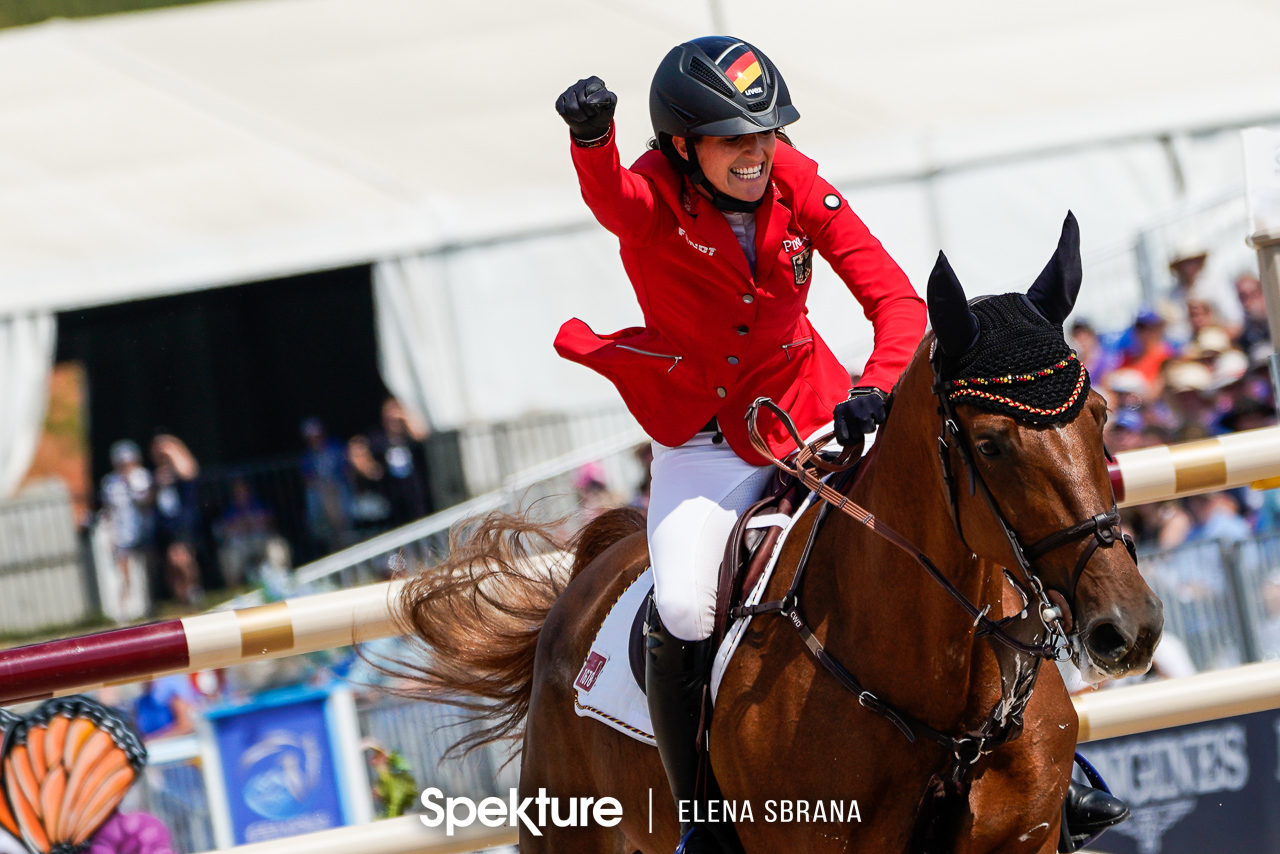 Earchphoto - Simone Blum celebrates her third clear round and the gold medal at the 2018 World Equestrian Games in Tryon NC