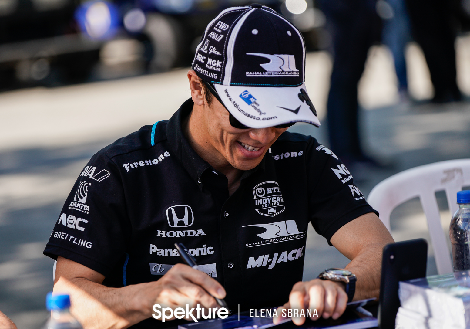 Earchphoto Sports - Takuma Sato signs autographs for the fans at IMS