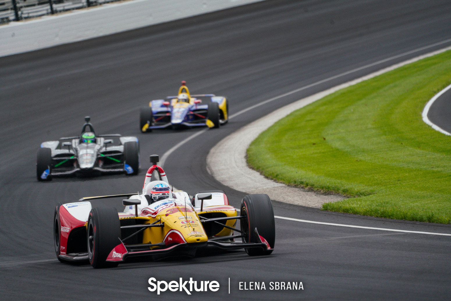 Earchphoto Sports - Takuma Sato leading a group of cars on the IMS oval