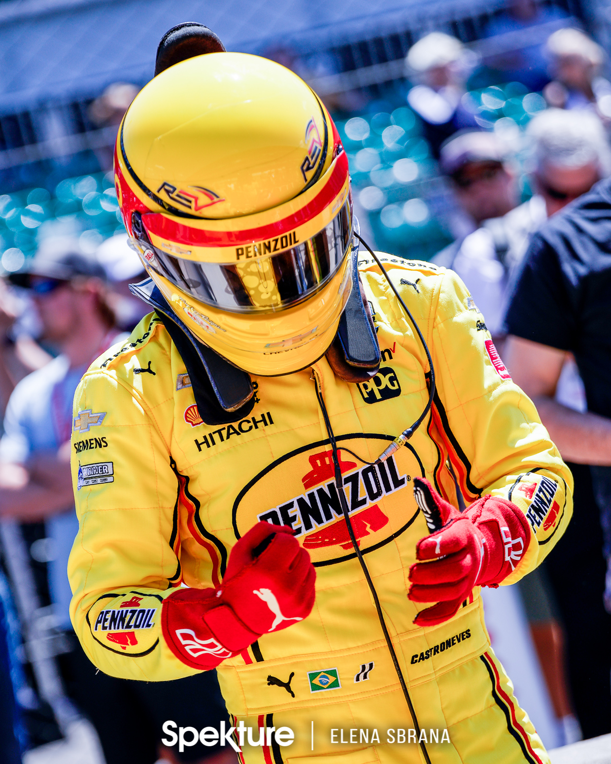 Earchphoto Sports - Helio Castroneves prepares to drive