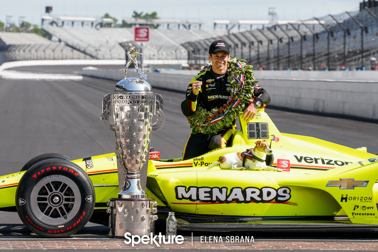 Earchphoto Sports - Simon Pagenaud with Norman and the Borg-Warner Trophy on the yard of bricks